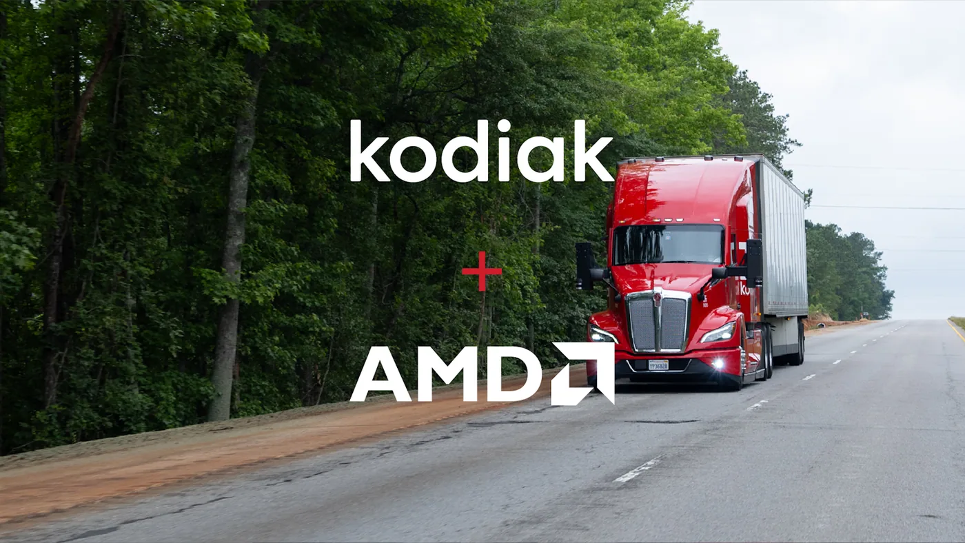 Camión Kodiak en ruta junto a las marcas Kodiak y AMD